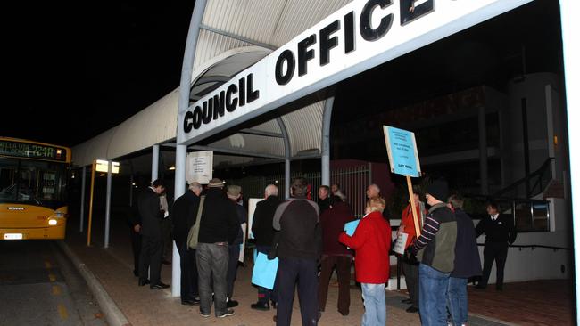 Protesters fight against a pay rise for the chief executive of then Onkaparinga Council CEO Mark Dowd.