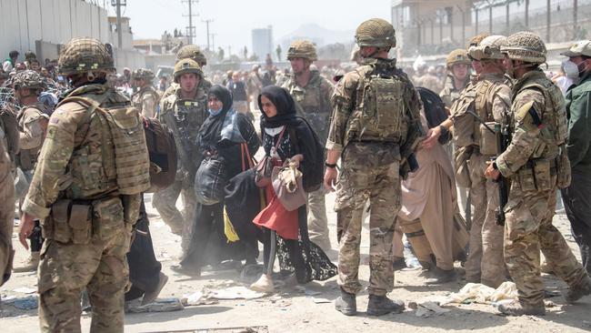 The British armed forces work with the US military to evacuate eligible civilians and their families out of Kabul, Afghanistan. Picture: Getty