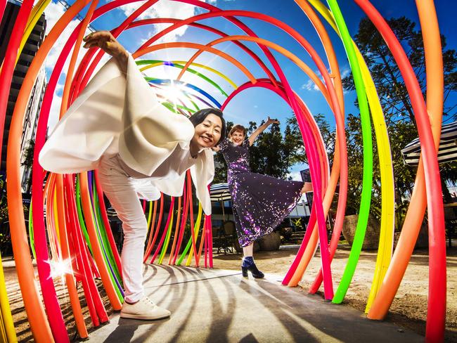 Hiromi Tango’s outdoor masterpiece, Rainbow Circles (Healing Circles), beckons people into a transformative space of joy and wonder in the garden space outside Metro Arts in West End. Tango is pictured with Metro Arts Jo Thomas. Picture: Nigel Hallett