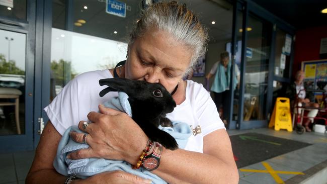 Donna Luck with her rabbit at the evacuation centre in Laurieton. Picture: Nathan Edwards