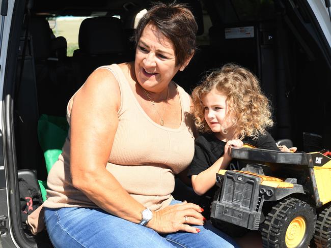 Ganette Smith with her grandson Harrison Buglar, 3, watching The Transporter Parade in Townsville. Picture: Shae Beplate.