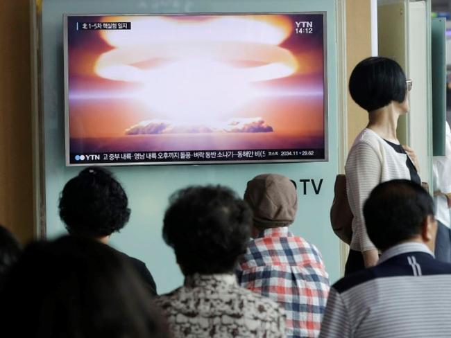 People at Seoul Railway Station watch a TV news program reporting a North Korean nuclear test. Picture: AP /Ahn Young-join