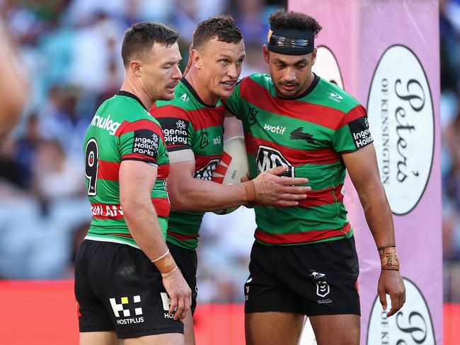 SYDNEY, AUSTRALIA - MARCH 29: Jack Wighton of the Rabbitohs celebrates scoring a try with team mates during the round four NRL match between South Sydney Rabbitohs and Canterbury Bulldogs at Accor Stadium, on March 29, 2024, in Sydney, Australia. (Photo by Cameron Spencer/Getty Images)