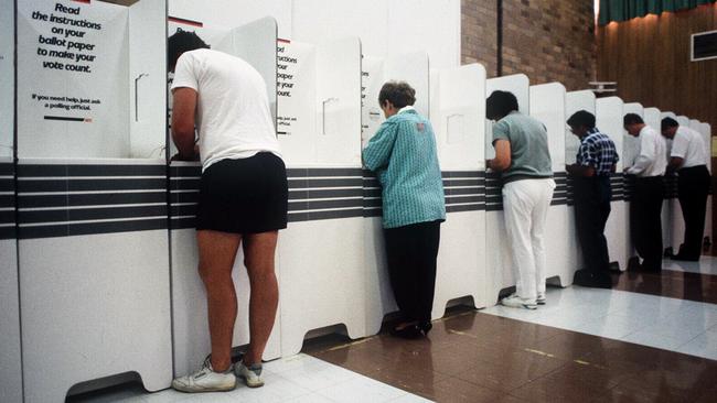 Voters line up to cast their ballots in the 1996 Howard-Keating election.