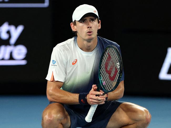 Australia's Alex De Minaur reacts on a point against Netherlands' Botic van de Zandschulp during their men's singles match on day three of the Australian Open tennis tournament in Melbourne on January 14, 2025. (Photo by Martin KEEP / AFP) / -- IMAGE RESTRICTED TO EDITORIAL USE - STRICTLY NO COMMERCIAL USE --