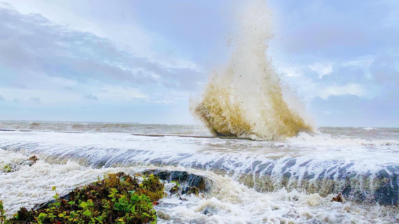 Waves crashing over the Sandgate foreshore. PHOTO CREDIT: Dianna Jean Photography