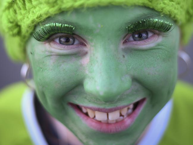 A young female Raiders fan is seen waiting outside the stadium ahead of the NRL Preliminary Final match between the Canberra Raiders and South Sydney Rabbitohs at GIO Stadium in Canberra, Friday, September 27, 2019. (AAP Image/Lukas Coch) NO ARCHIVING, EDITORIAL USE ONLY