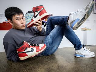 Sneaker collector Michael Fan with a pair of his $1m Jordans at the Museum of Authentics exhibition in Brunswick. Picture: Jake Nowakowski