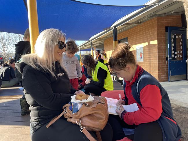 Albanvale Primary School: Amy and Madison read during Albanvale Primary School's LIFFEST reading festival. Picture: Athos Sirianos