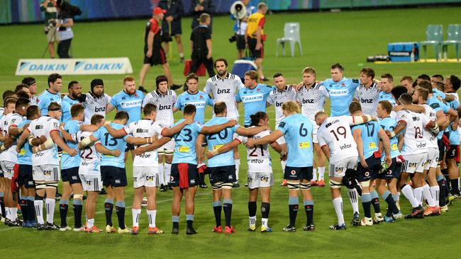 A moment of silence for the Christchurch terror attack at the beginning of the Waratahs-Crusaders Super Rugby clash. Picture: AAP