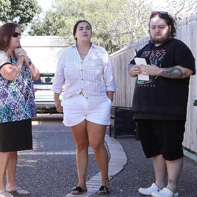 The boy’s grandmother (right) with others at the scene in Deception Bay. Picture: Liam Kidston