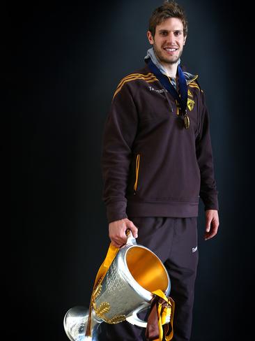 Tasmanian Hawthorn player Grant Birchall with the Premiership Cup at Princes Wharf. Picture: SAM ROSEWARNE