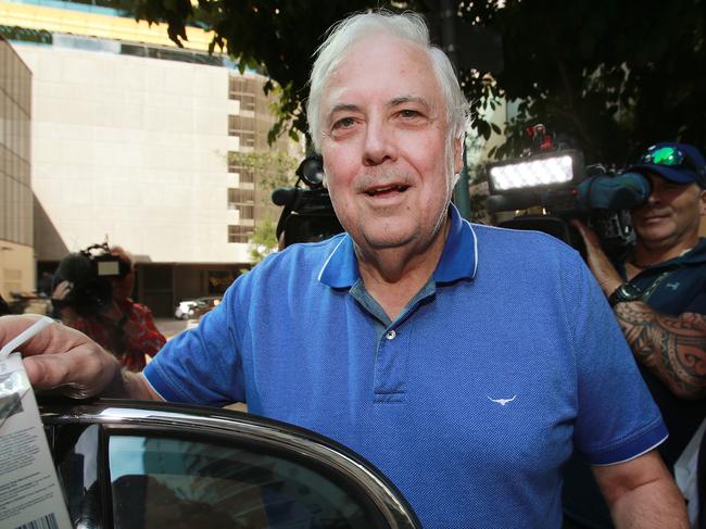 Embattled businessman Clive Palmer leaves the Federal Court with his barrister Andrew Boe (right) after giving evidence at the public examination of the collapse of Queensland Nickel.Photo: Claudia Baxter