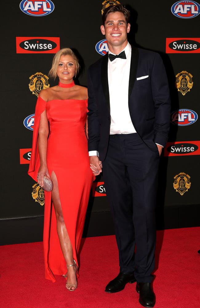 Tom Hawkins of Geelong and partner Emma Clapham arrive on the red carpet for the 2015 AFL Brownlow Medal. Picture: Tim Carrafa