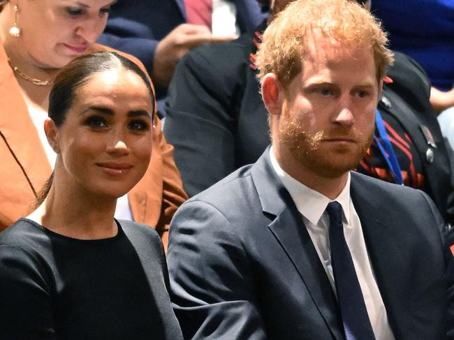 (FILES) Prince Harry (R) and Meghan Markle (L), the Duke and Duchess of Sussex, attend the 2020 UN Nelson Mandela Prize award ceremony at the United Nations in New York on July 18, 2022. A multi-million-dollar deal between a media group run by Britain's Prince Harry and his wife Meghan Markle, and streaming giant Spotify is to end, a report said June 15, 2023. (Photo by TIMOTHY A. CLARY / AFP)