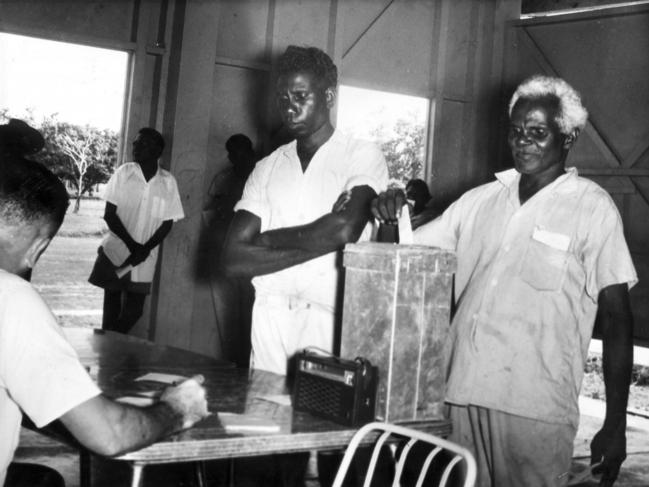 NT Aboriginals voting for the first time, at Bagot Darwin - Tuesday Cooper of the Iwaija tribe casts his vote in elections for 7 members of the NT Legislative Council  - Dec 1962  file pic Douglas/Lockwood headshot