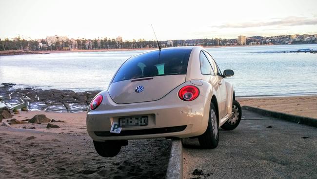 A car ends up off the boat ramp at Shelly Beach. Pic credit: Tim Ettle