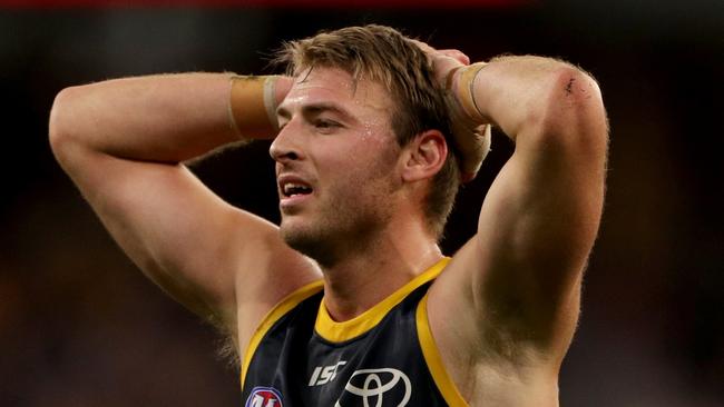 Daniel Talia of the Crows reacts after their loss to the West Coast Eagles in Perth. Picture: AAP Image/Richard Wainwright