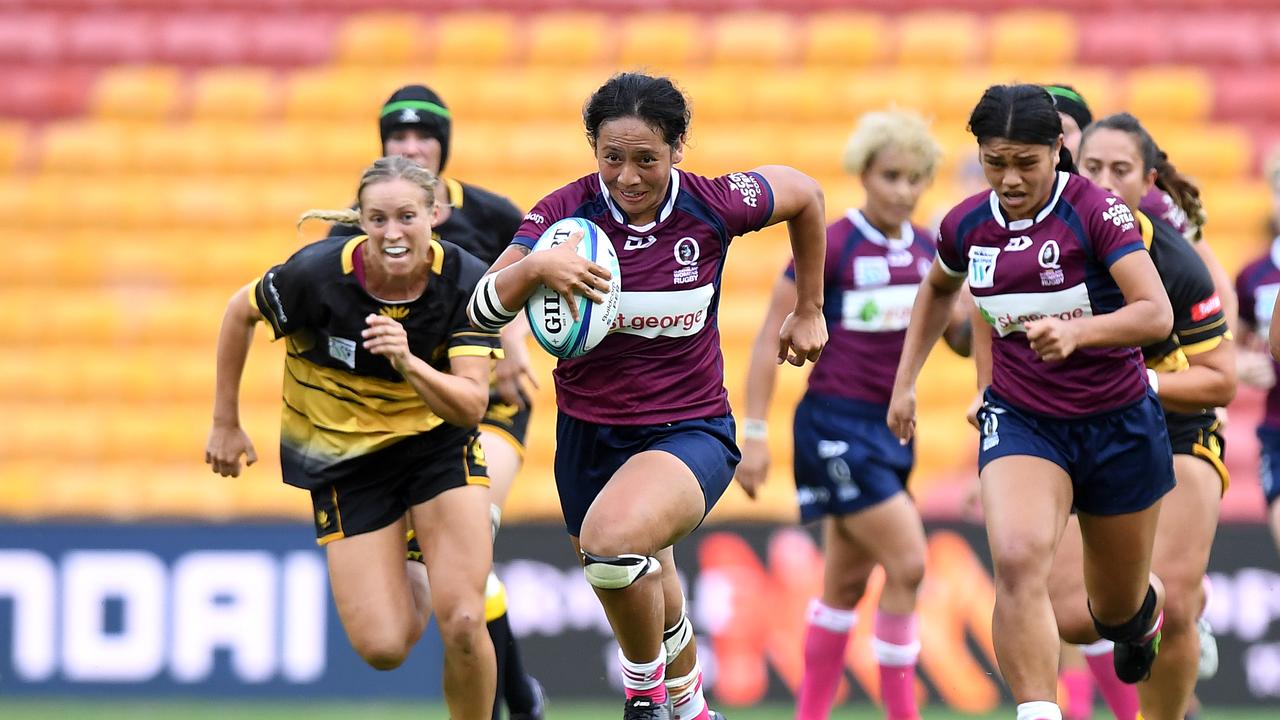 Cecilia Smith earlier in her career running in tries for the Queensland Reds Super W side.