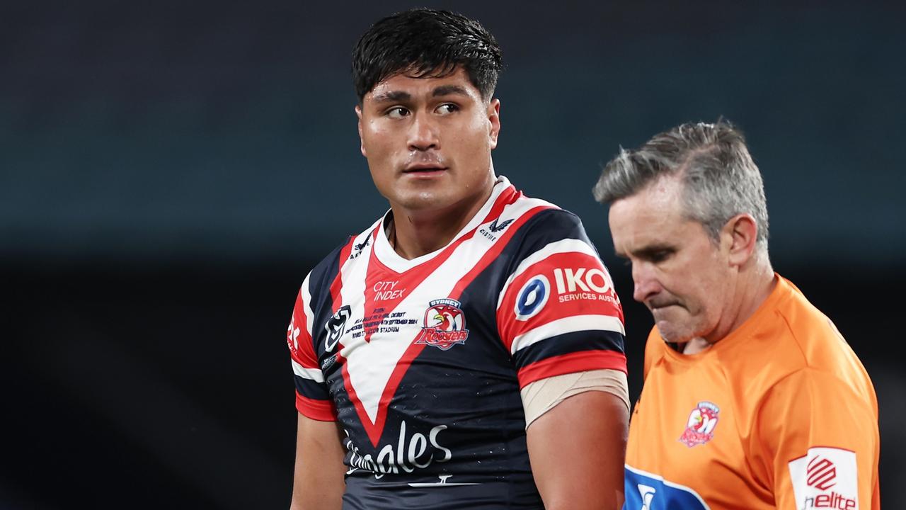 De La Salle Va'a of the Roosters leaves the field for a HIA. Picture: Getty Images