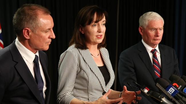 Premier Jay Weatherill, Child Development Minister Susan Close and Attorney General John Rau addressing the Royal Commission report.