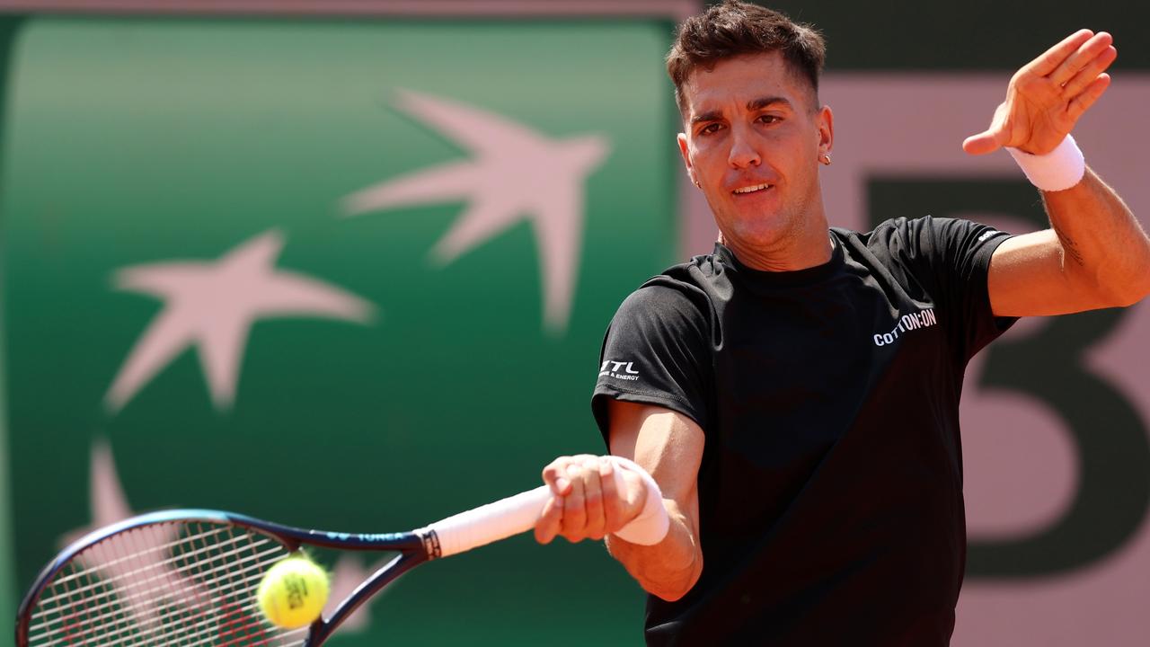 French Open: Thanasi Kokkinakis upsets Dan Evans to end eight-year wait ...