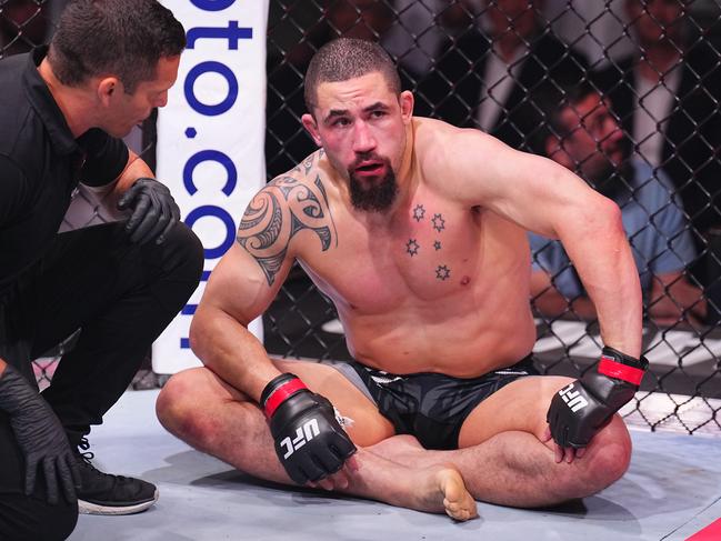 ABU DHABI, UNITED ARAB EMIRATES - OCTOBER 26: Robert Whittaker of New Zealand reacts after a submission loss against Khamzat Chimaev of Russia in a middleweight fight during the UFC 308 event at Etihad Arena on October 26, 2024 in Abu Dhabi, United Arab Emirates. (Photo by Chris Unger/Zuffa LLC)