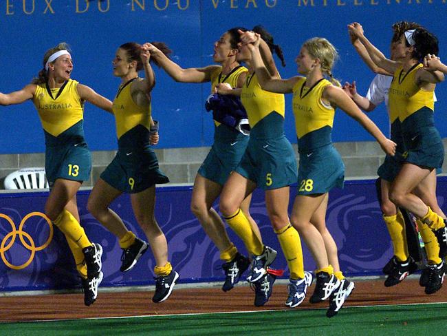 The Aussies celebrate victory over Argentina in the final.