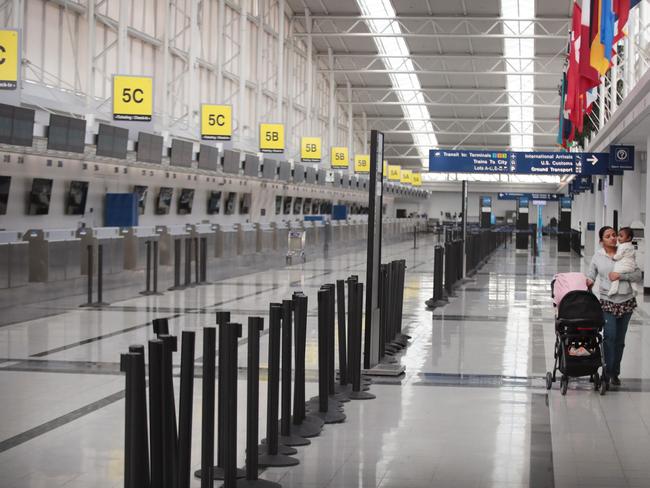 The international terminal at Chicago’s usually bustling O'Hare Airport is almost deserted. Picture: Getty Images/AFP