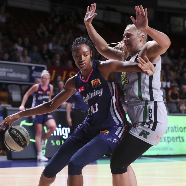 Tayla Roberts (right) defends Kayla Alexander in a WNBL clash between Adelaide Lightning and Dandenong in 2018. Picture SARAH REED