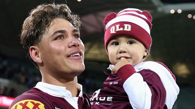 Reece Walsh with daughter Leila after winning Game 1 of the 2023 State of Origin series. (Photo by Cameron Spencer/Getty Images)