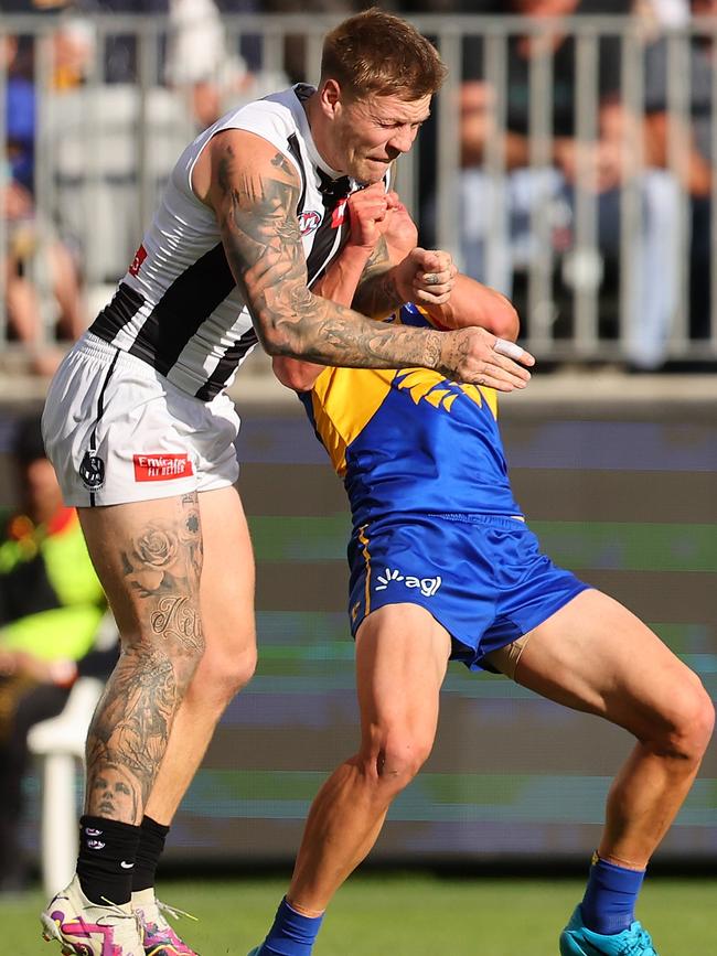 Jordan De Goey’s bump on young Eagle Elijah Hewett is likely to see him miss Collingwood’s next clash against Melbourne. Picture: Paul Kane/Getty Images