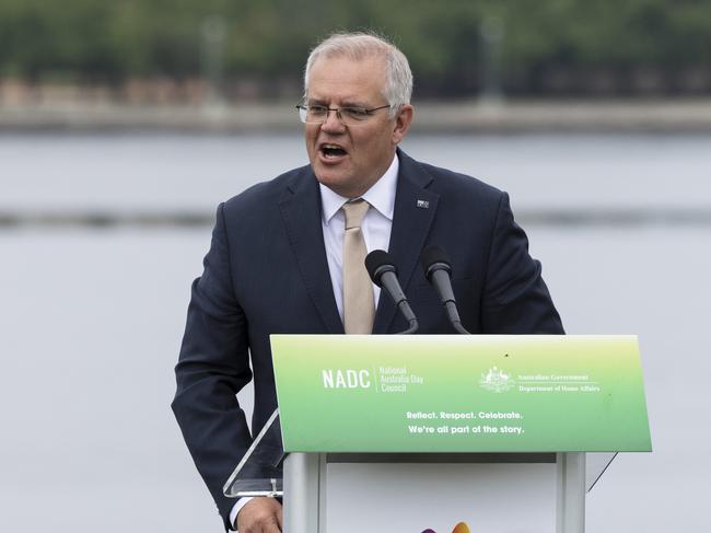 CANBERRA, AUSTRALIA - JANUARY 26: Australian Prime Minister Scott Morrison speaks at the Citizenship and Flag Raising Ceremony on January 26, 2022 in Canberra, Australia.  Australia Day, formerly known as Foundation Day, is the official national day of Australia and is celebrated annually on January 26 to commemorate the arrival of the First Fleet to Sydney in 1788. Indigenous Australians refer to the day as 'Invasion Day' and there is growing support to change the date to one which can be celebrated by all Australians. (Photo by Brook Mitchell/Getty Images)