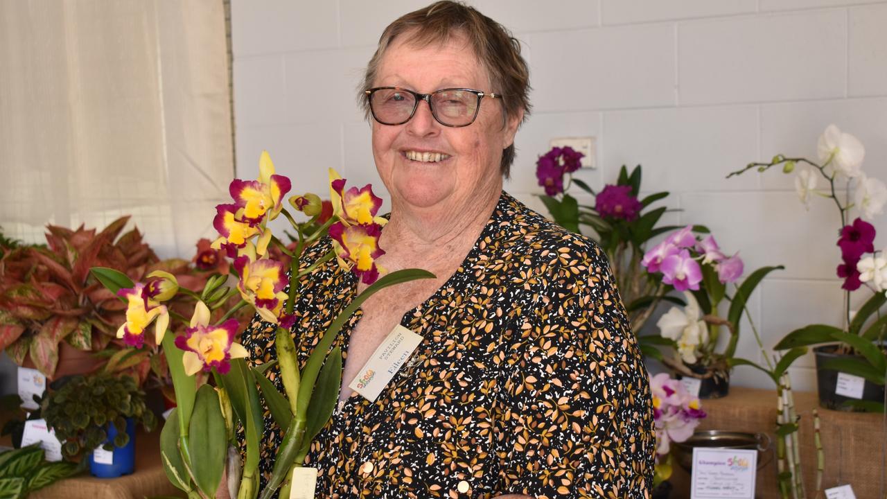 Show steward Eileen Cameron of Proserpine won Most Successful Horticulture Exhibitor for her stunning selection of orchids and bromeliads. Picture: Kirra Grimes