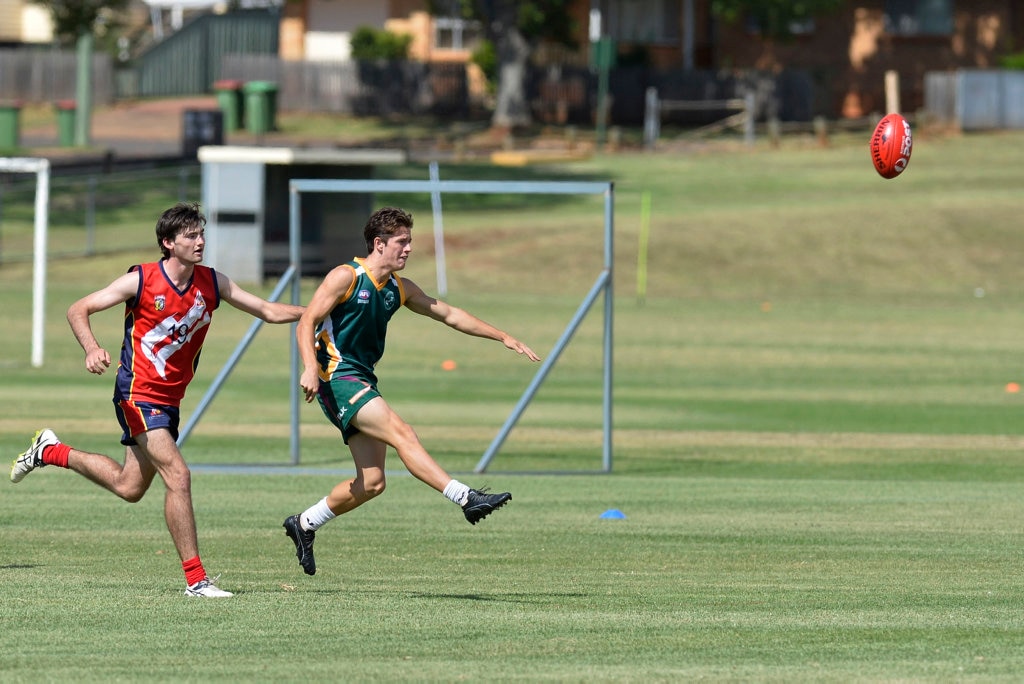 Keiran Petyt-Bihel kicks for Centenary Heights State High School against Concordia in AFL Queensland Schools Cup Darling Downs round at Captain Cook ovals, Friday, April 27, 2018. Picture: Kevin Farmer