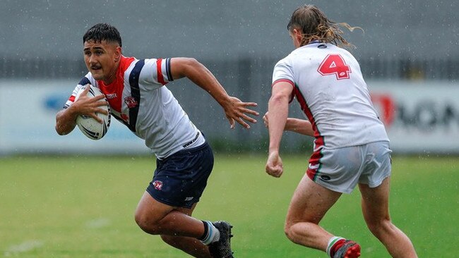 Action in a wet Central Coast Roosters match on the weekend.