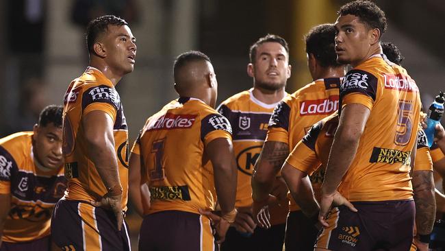 Broncos players look dejected during their round 10 NRL match against Wests Tigers at Leichhardt Oval. Picture: Cameron Spencer/Getty Images