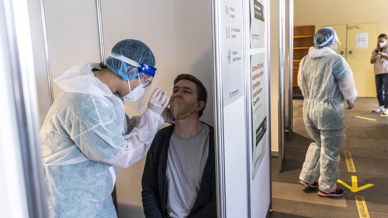 A medical worker swabs a man in Berlin, Germany where 75 per cent of coronavirus cases are now the contagious strain from the UK. Picture: Maja Hitij/Getty Images