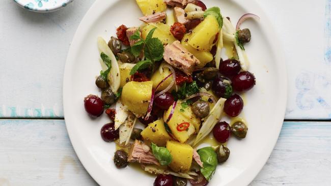 Potato salad with capers, tuna and olive crumble.