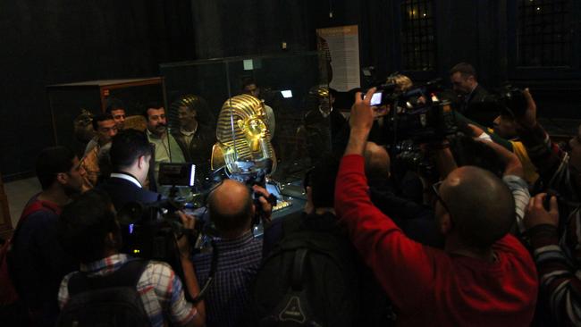 Intense interest ... A media scrum gathers to take pictures of Pharaoh Tutankhamun, who ruled Egypt from 1334 to 1325BC.