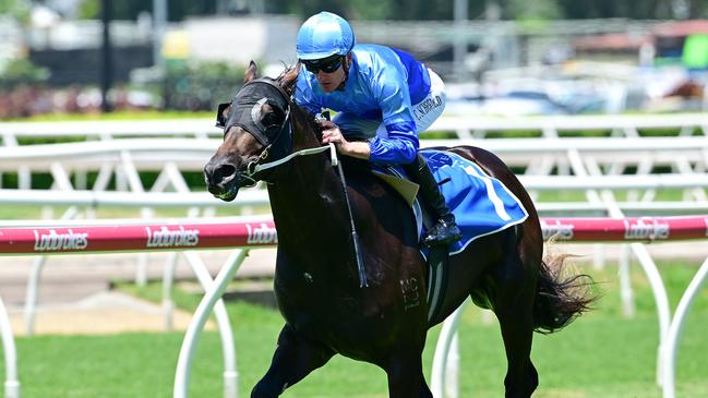 Space Rider dashes away under Chad Schofield to win the QTIS 2YO handicap at Eagle Farm for jockey Chad Schofield. Picture: Grant Peters/Trackside Photography