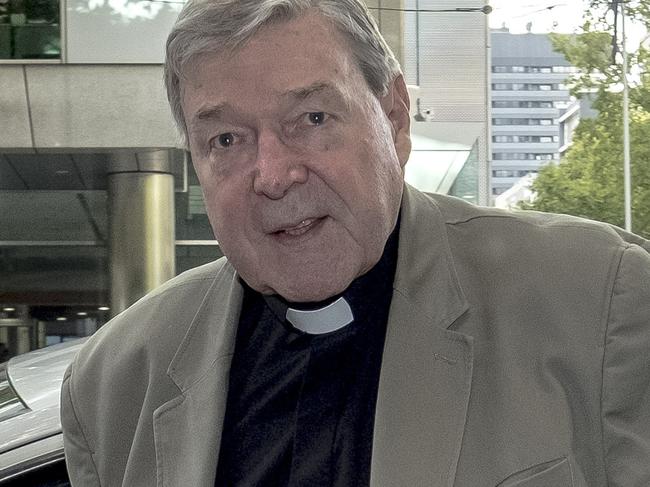 Catholic Cardinal George Pell arrives at the Melbourne Magistrates Court in Melbourne, Australia, Wednesday, March 21, 2018. (AAP Image/Luis Ascui) NO ARCHIVING