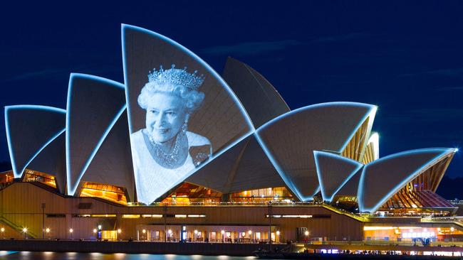 The Sydney Opera House sails lit up with the picture of Queen Elizabeth II. Picture: AFP