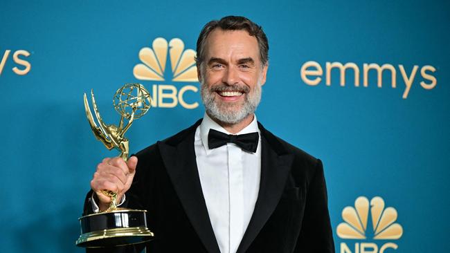 Australian actor Murray Bartlett poses with the Emmy for his work on The White Lotus, during the 2022 Emmy Awards. Bartlett was nominated for two awards at the 2023 ceremony, which was scheduled to take place on September 12, but may be pushed back to January next year due to the ongoing writers and actors strikes in Hollywood. Picture: AFP