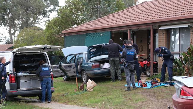 Police search the Wodonga west property yesterday. Picture: Simon Dallinger