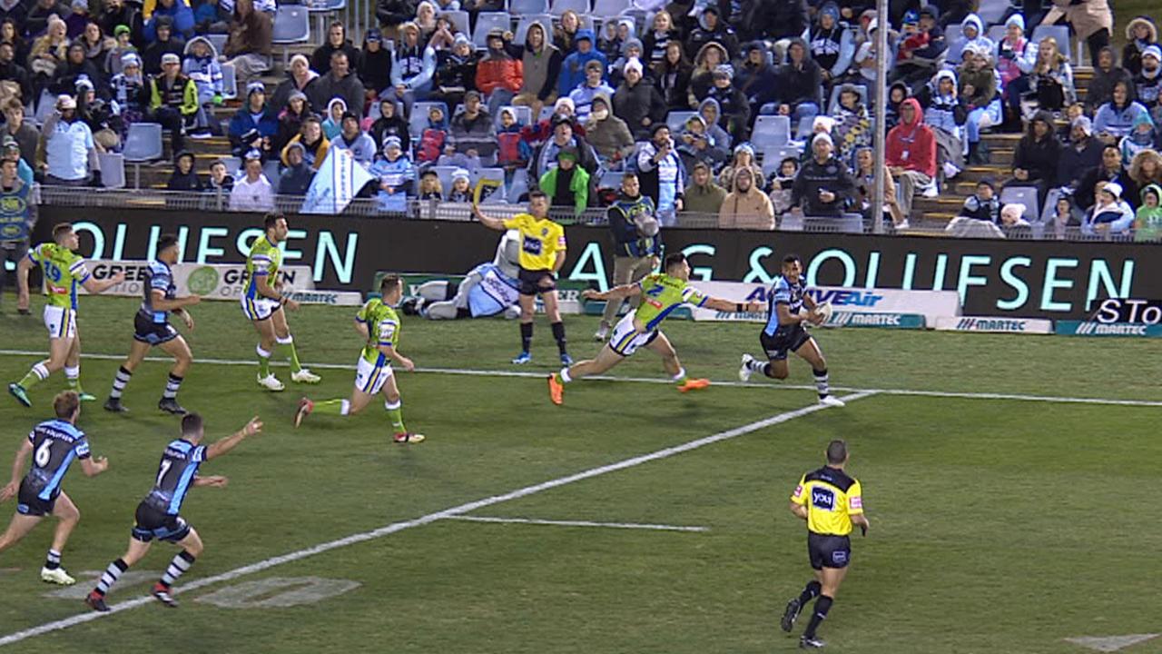 Touch judge raises his flag before the Sharks scored through Sione Katoa.