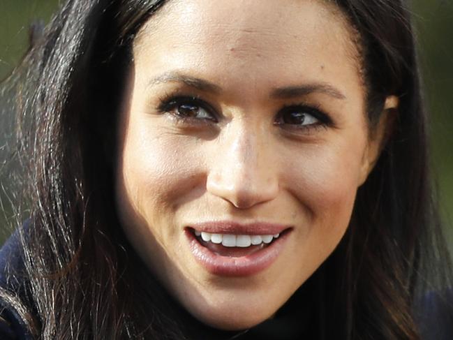 Britain's Prince Harry's fiancee Meghan Markle arrives at Nottingham Academy in Nottingham, England , Friday, Dec. 1, 2017. It was announced on Monday that Prince Harry and American actress Meghan Markle are engaged and will marry in the spring of 2018. (AP Photo/Frank Augstein)