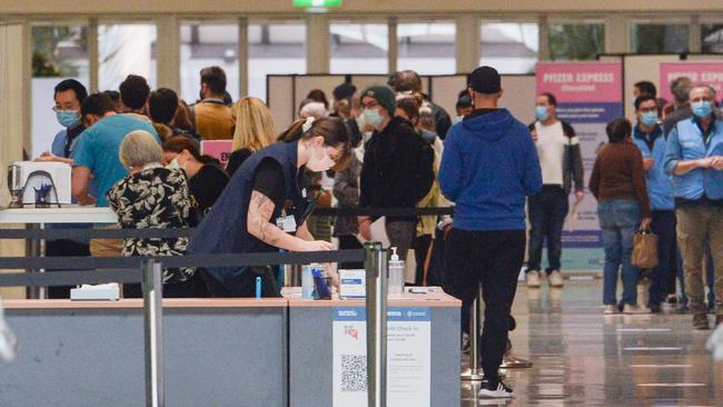 People entering the Wayville COVID-19 vaccination hub in Adelaide. Picture: NCA NewsWire /Brenton Edwards