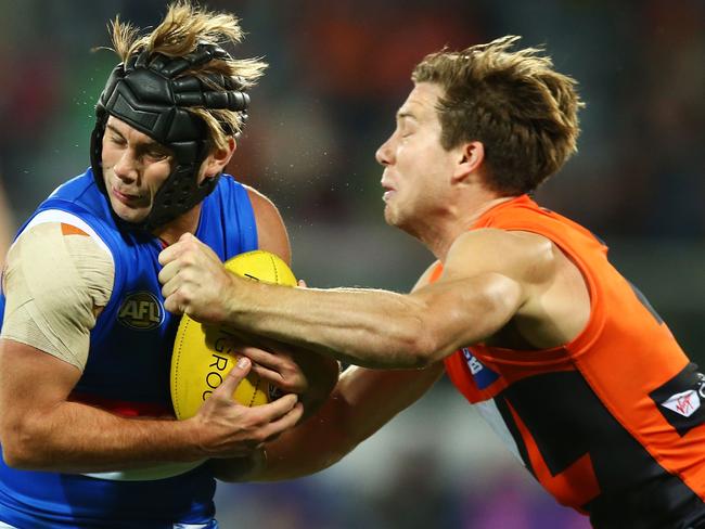 CANBERRA, AUSTRALIA - APRIL 28:  Toby Greene of the Giants makes a late hit on Caleb Daniel of the Bulldogs during the round six AFL match between the Greater Western Sydney Giants and the Western Bulldogs at UNSW Canberra Oval on April 28, 2017 in Canberra, Australia.  (Photo by Mark Nolan/AFL Media/Getty Images)