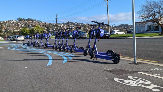 Beam Mobility e-scooters banked outside Launceston's Riverbend Park. Picture: Alex Treacy